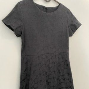 Petite black sleeve dress.